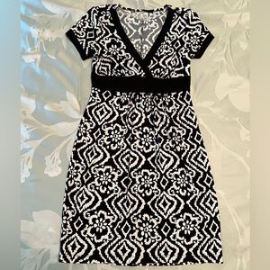 Black and white patterned v-neck dress